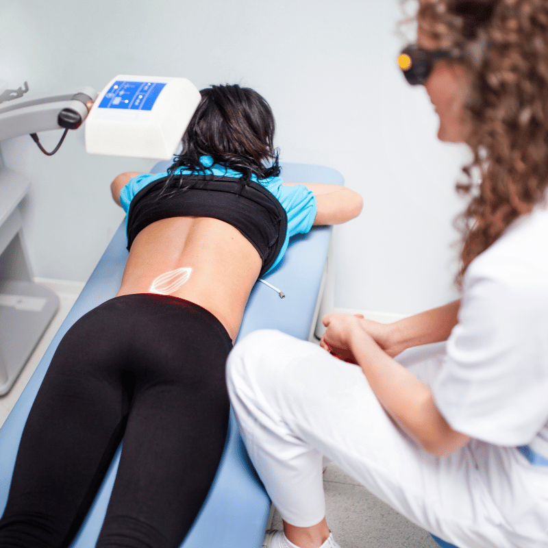 Laser therapy session on back